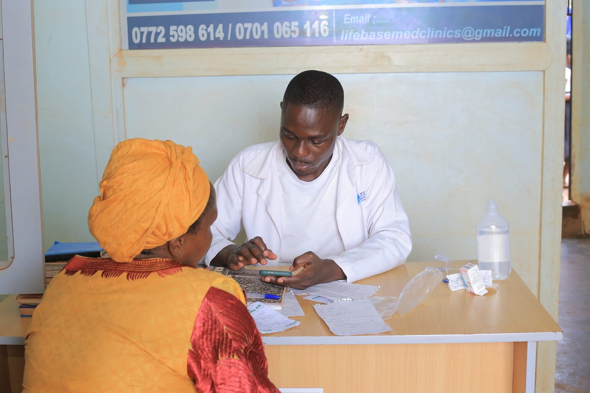 Doctor consulting with patient